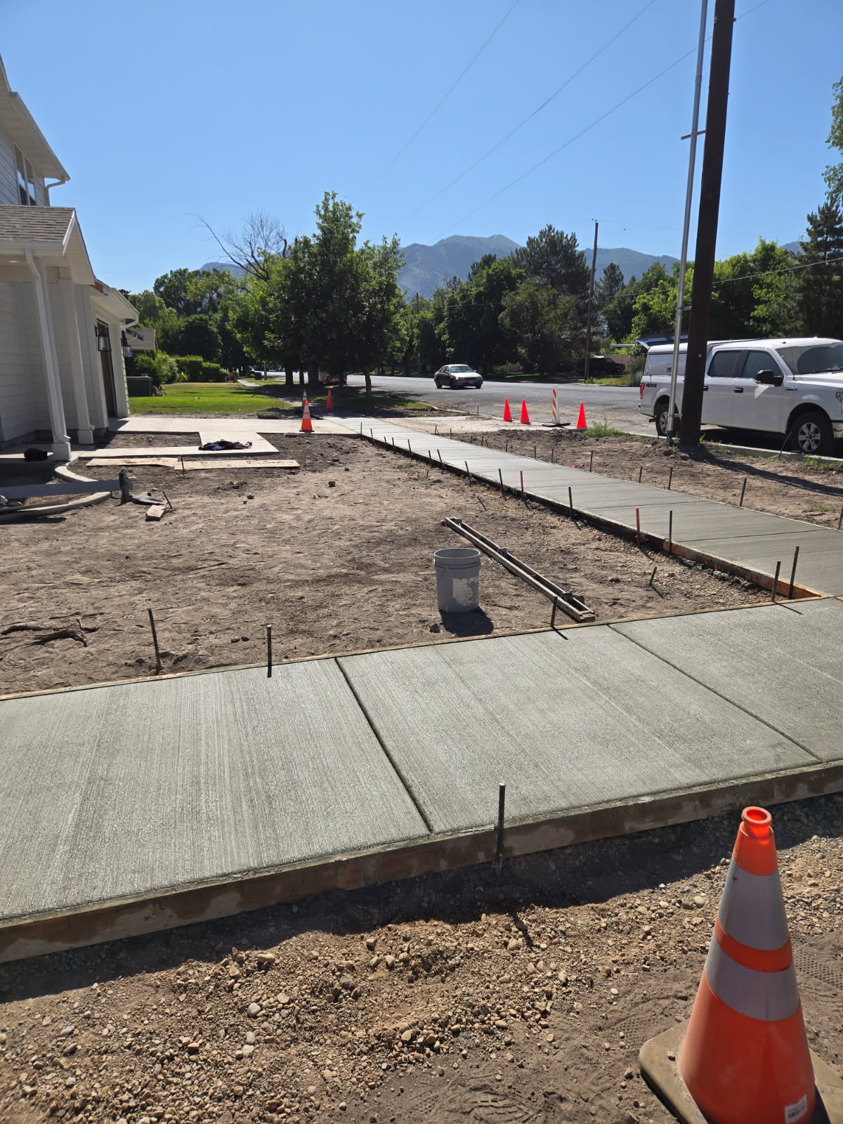Fresh concrete sidewalk and driveway flatwork